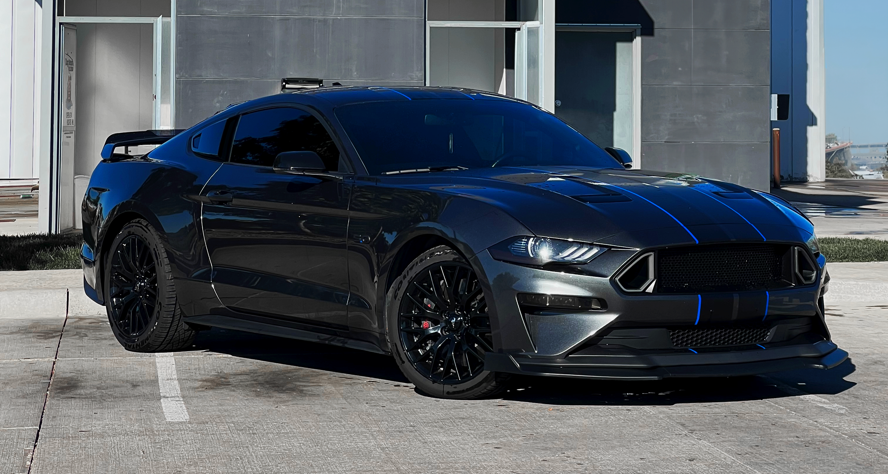 Ford Mustang GT with carbon fiber mirror covers, interior trim, and S650 Style RGB Taillights.